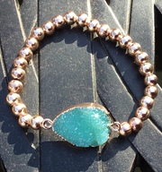 Rose Gold Plated with torquoise resin stone